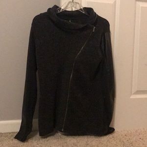 Maurice’s sweater with leather detail